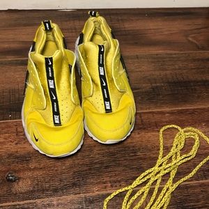 Yellow Nike sportswear Huaraches